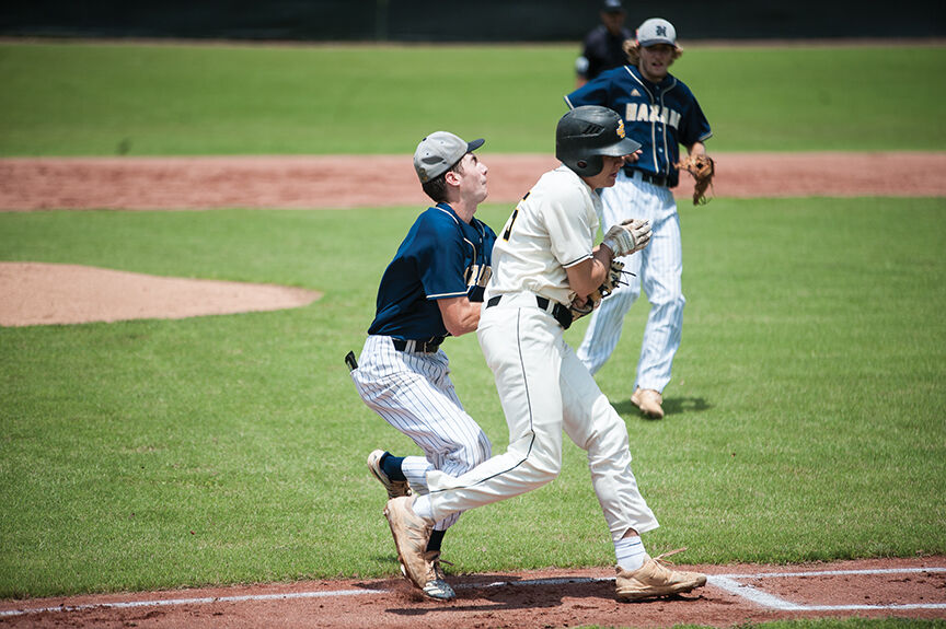 6-15 jc gavin crum collides with sawyer patrick.jpg